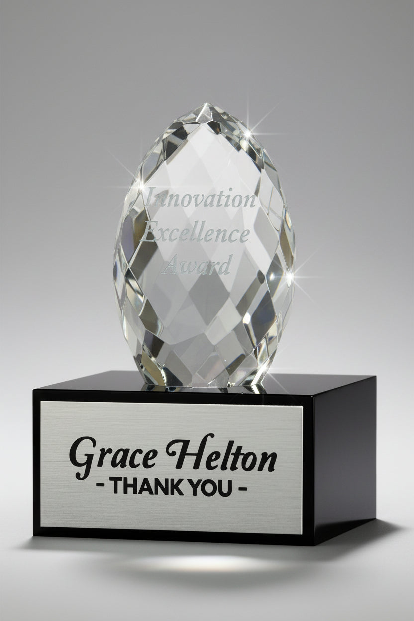 Crystal Faceted Egg on Black Glass Base