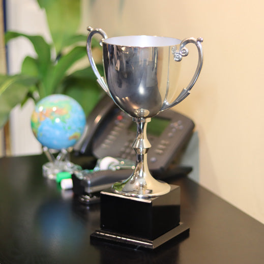 Silver Metal Cup on Black Base